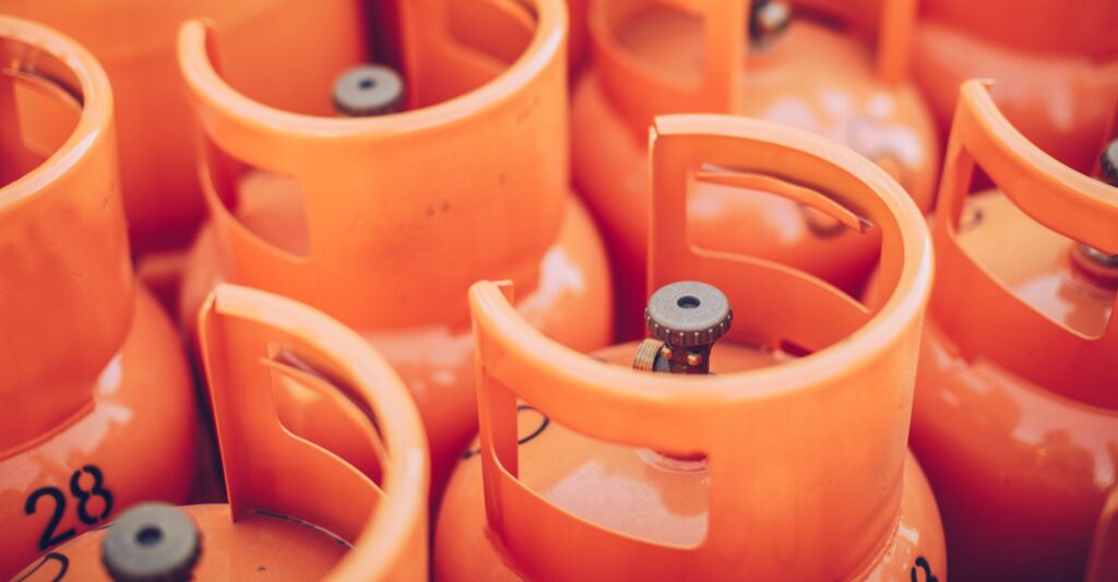 Orange industrial gas tanks